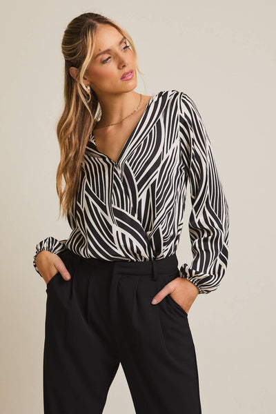JALISA ABSTRACT SURPLICE BODYSUIT IN WHITE/BLACK-bodysuits-MODE-Couture-Boutique-Womens-Clothing