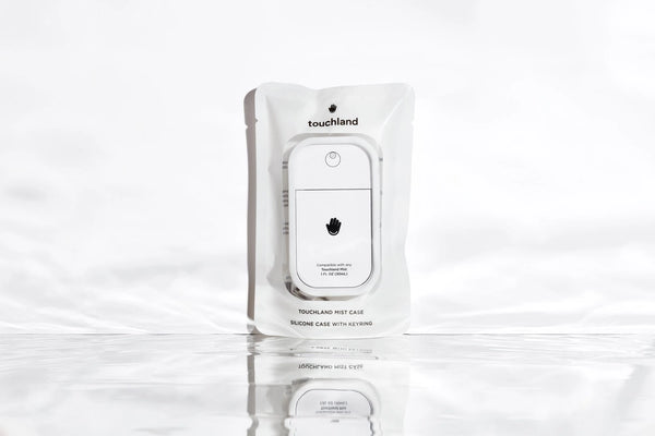 TOUCHLAND MIST CASE IN WHITE-hand sanitizer-MODE-Couture-Boutique-Womens-Clothing