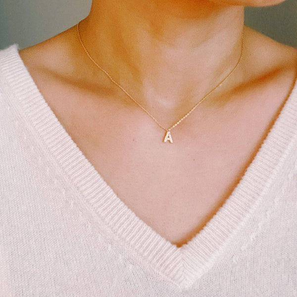 UNDERSTATED BEAUTY INITIAL NECKLACE IN GOLD-NECKLACE-MODE-Couture-Boutique-Womens-Clothing