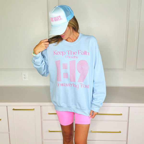 KEEP THE FAITH GRAPHIC SWEATSHIRT IN LIGHT BLUE-MODE-Couture-Boutique-Womens-Clothing