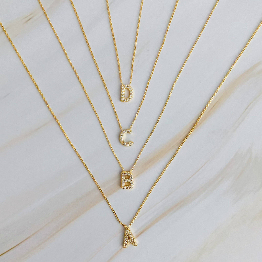 UNDERSTATED BEAUTY INITIAL NECKLACE IN GOLD-NECKLACE-MODE-Couture-Boutique-Womens-Clothing
