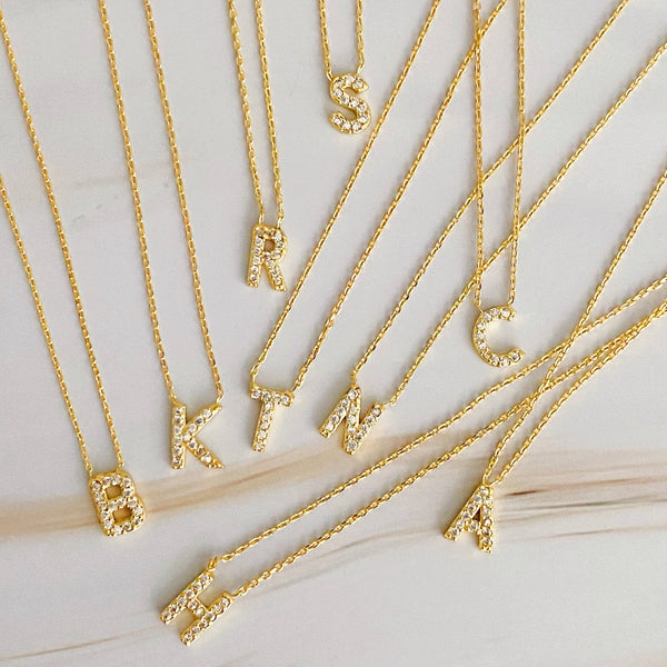 UNDERSTATED BEAUTY INITIAL NECKLACE IN GOLD-NECKLACE-MODE-Couture-Boutique-Womens-Clothing