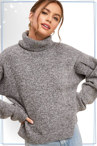FIRESIDE CHAT LOOSE FIT PIN TUCK SLEEVE TURTLENECK SWEATER IN SESAME BLACK-Sweaters-MODE-Couture-Boutique-Womens-Clothing