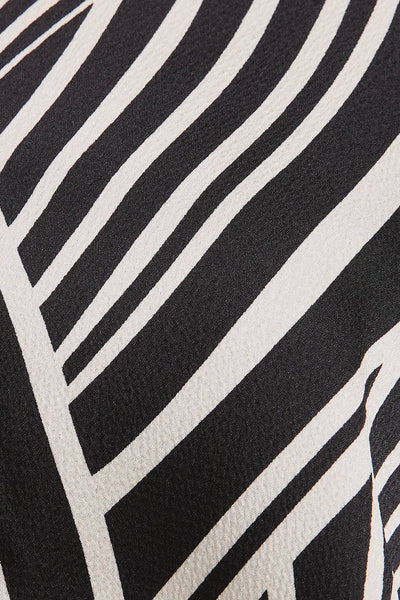 JALISA ABSTRACT SURPLICE BODYSUIT IN WHITE/BLACK-bodysuits-MODE-Couture-Boutique-Womens-Clothing