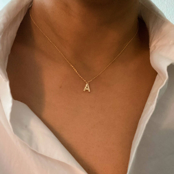 UNDERSTATED BEAUTY INITIAL NECKLACE IN GOLD-NECKLACE-MODE-Couture-Boutique-Womens-Clothing