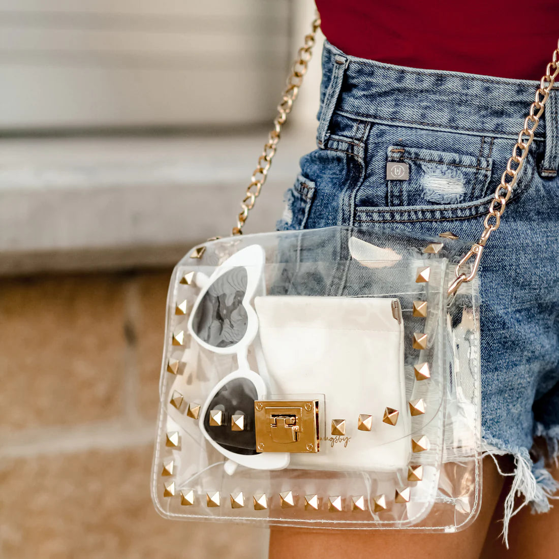 STUD CLEAR CROSSBODY STADIUM PURSE WITH GOLD DETAIL