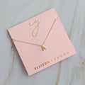 UNDERSTATED BEAUTY INITIAL NECKLACE IN GOLD-NECKLACE-MODE-Couture-Boutique-Womens-Clothing