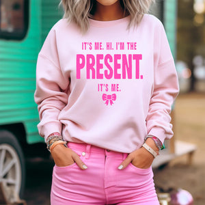 HI IT'S ME, I'M THE PRESENT GRAPHIC SWEATSHIRT IN PINK-MODE-Couture-Boutique-Womens-Clothing